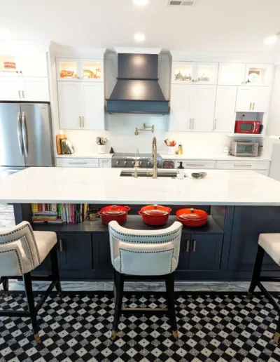 A kitchen with a black and white checkered floor.